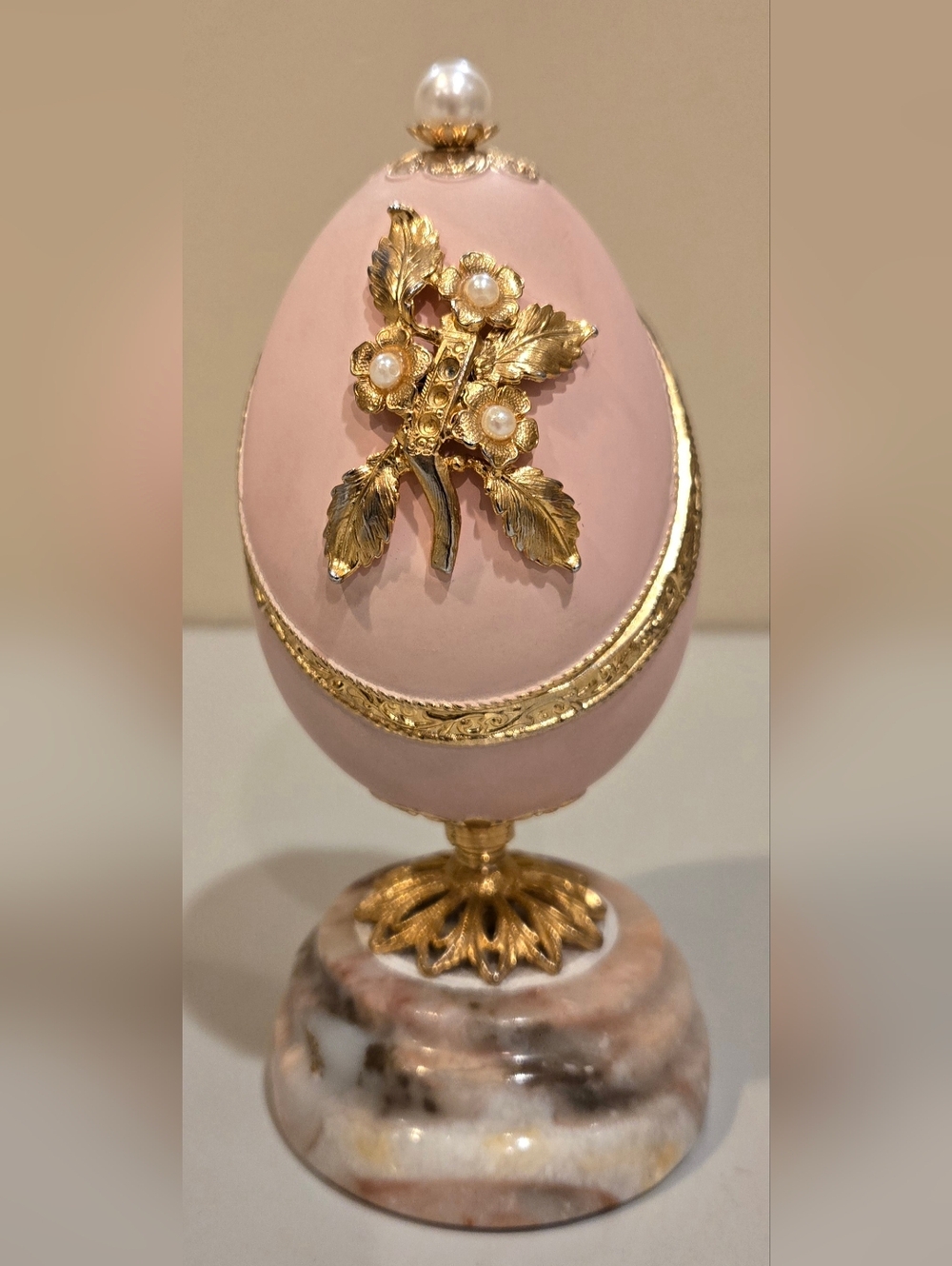 Pink Decorative Egg Jewelry Box with Gold Accents and Pearl Details